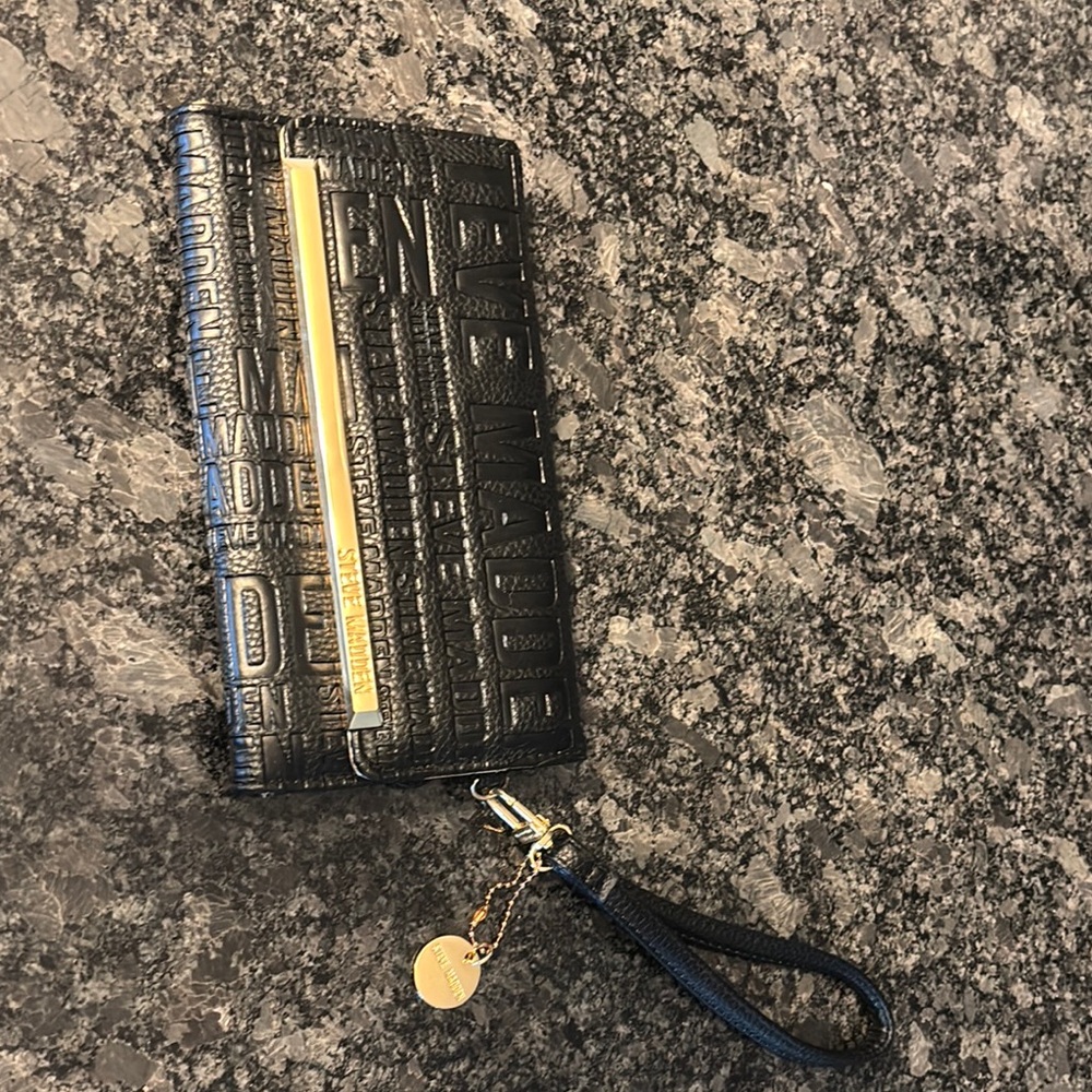 Steve Madden Black Cell Phone Case with Textured Design and Gold Zipper